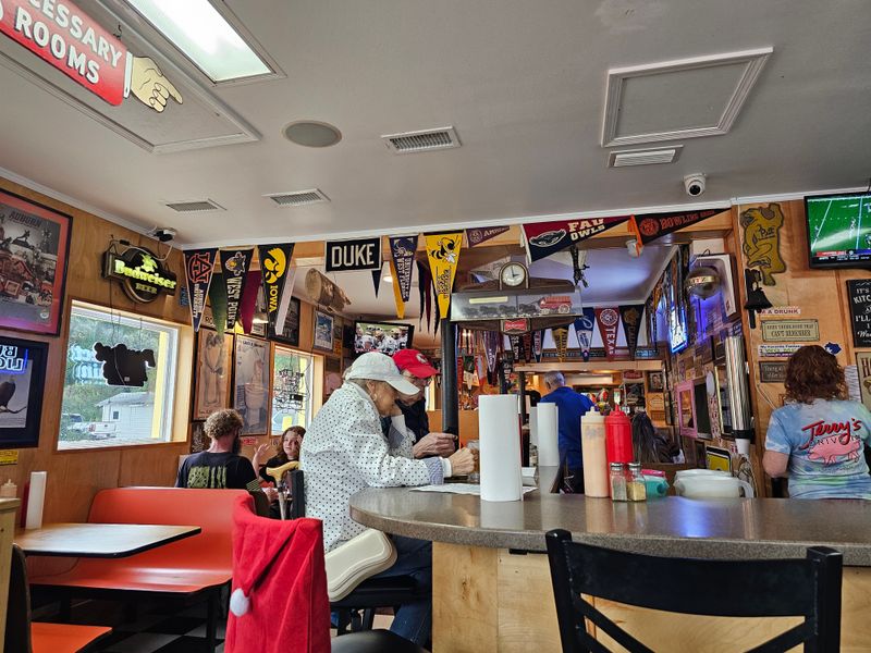 This Florida Retro Roadside Drive-In Griddles Bacon Cheeseburgers, Fried Grouper, And Banana Shakes The Way Panhandle Locals Remember 10 Service With Personality