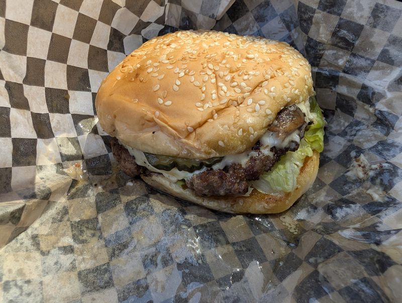 This Oregon Small-Town Burger Stand Turns Crispy Fries And Thick Milkshakes Into A Must-Stop Roadside Ritual 6 The Signature Burger Bite