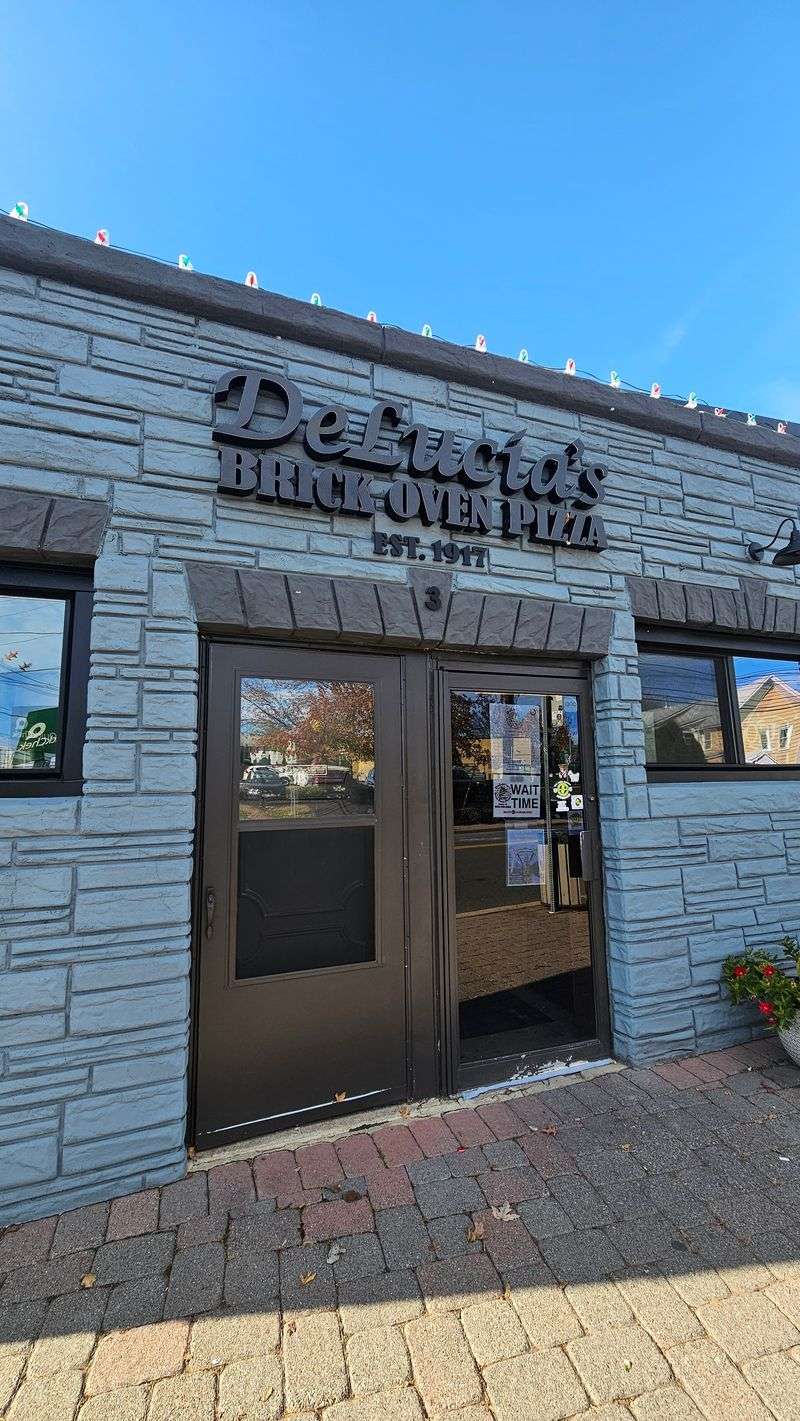 12 Family-Run Italian Counters Across America Still Serving Red Sauce Like It’s the 1950s 6 DeLucia's Brick Oven Pizza - Raritan, New Jersey