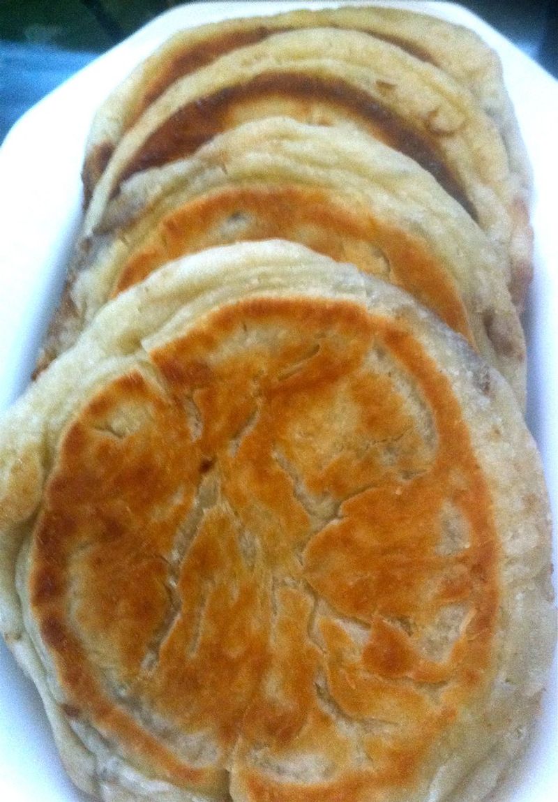 14 Korean Street Foods That Explain Why K-Food Is Exploding Right Now 6 Hotteok (Sweet Filled Pancakes)