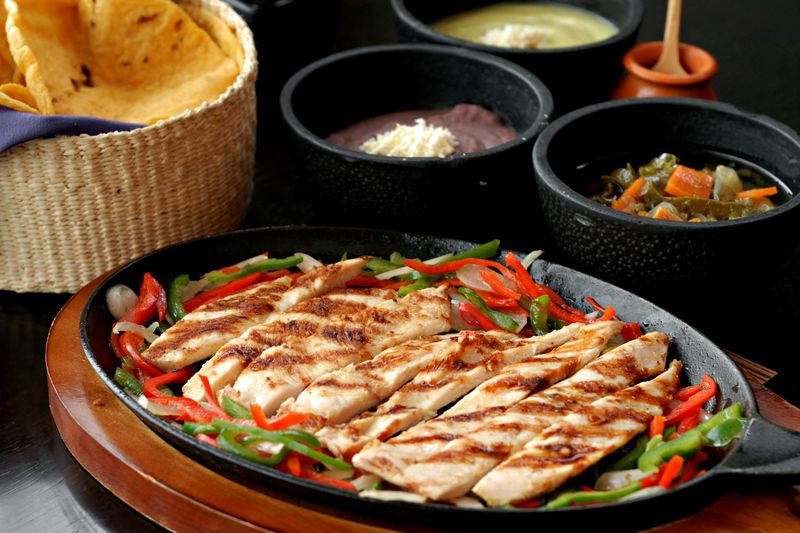 21 Mexican Dishes Americans Can’t Stop Ordering - And What You Should Try Next 6 Chicken Fajitas