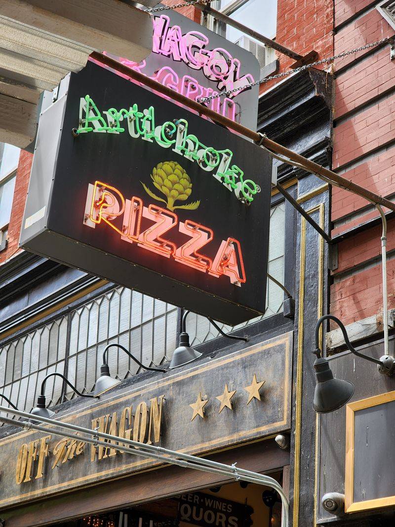 22 Late-Night Pizza Windows Across America Where Slices Disappear Faster Than They Hit the Counter 13 Artichoke Basille's Pizza - New York, New York