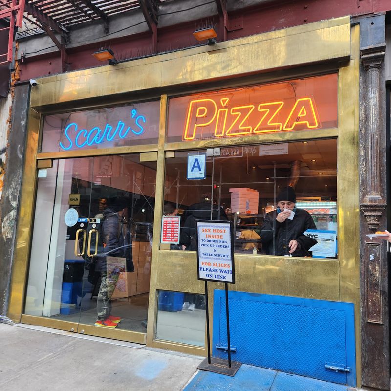 22 Late-Night Pizza Windows Across America Where Slices Disappear Faster Than They Hit the Counter 18 Scarr's Pizza - New York, New York