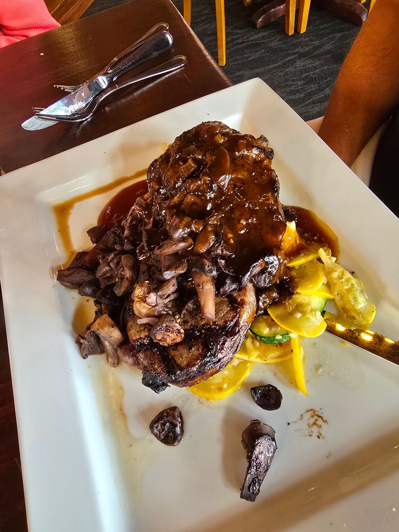 This Michigan Waterfront Grill Serves Whitefish Locals Call “Pure Lake Tradition” 12 Braised Short Rib