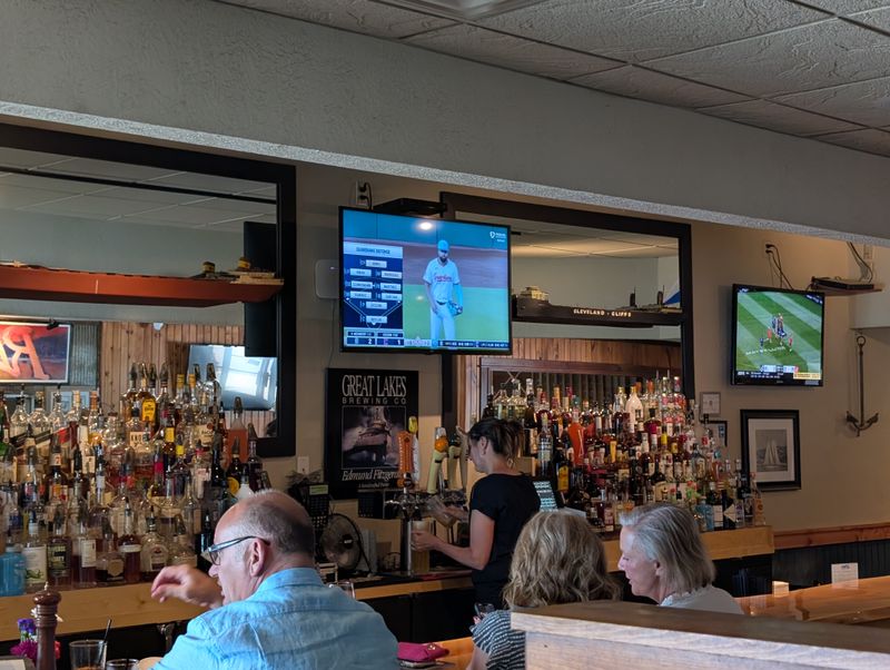 This Michigan Waterfront Grill Serves Whitefish Locals Call “Pure Lake Tradition” 14 Classic Burger With Add Ons