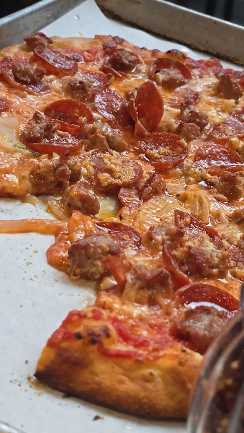 22 Late-Night Pizza Windows Across America Where Slices Disappear Faster Than They Hit the Counter 23 Piece Pizzeria and Brewery - Chicago, Illinois