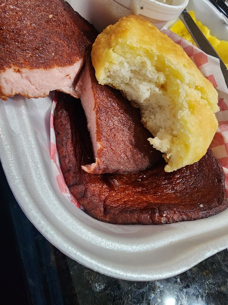 This Alabama Biscuit House Serves Sausage Gravy Locals Say Defines Southern Mornings 5 Bologna Biscuit and Cinnamon Roll Combo