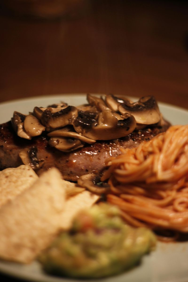 Grilled Steak with Mushroom Sauce, Pasta and Guacamole