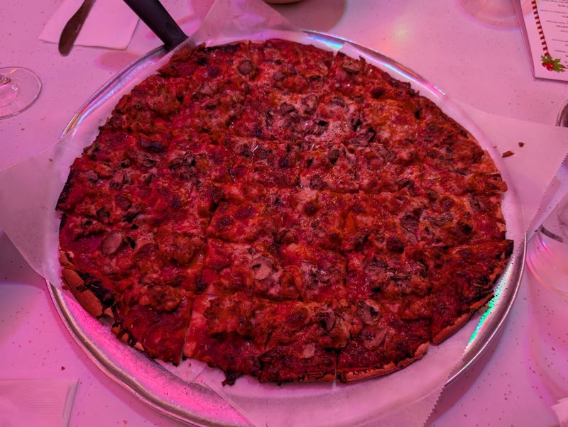 This Chicago Pizza Spot Serves Thin Crust Pizza Locals Say Is The Real Deal 12 Sausage That Means Business