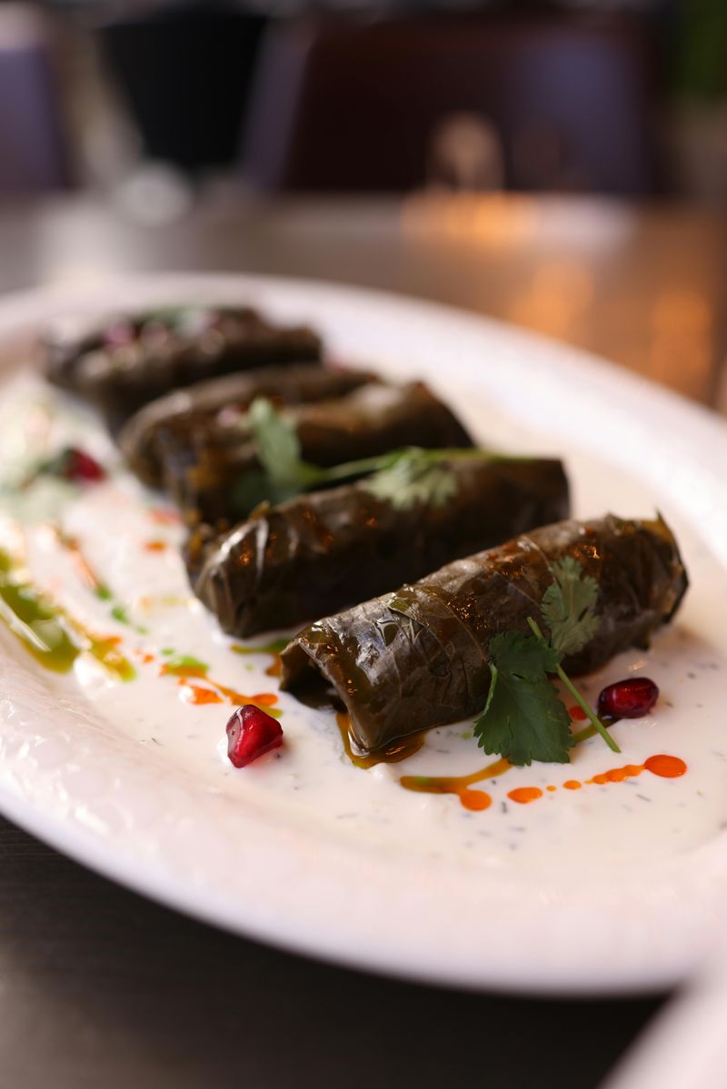 10 Mediterranean Mezze Plates That Turn a Simple Dinner Into a Feast 10 Dolmades (Stuffed Grape Leaves)