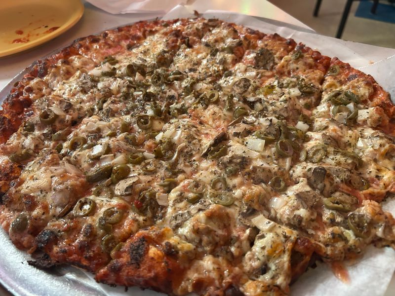 This Chicago Pizza Spot Serves Thin Crust Pizza Locals Say Is The Real Deal 8 Why Locals Call It The Real Deal