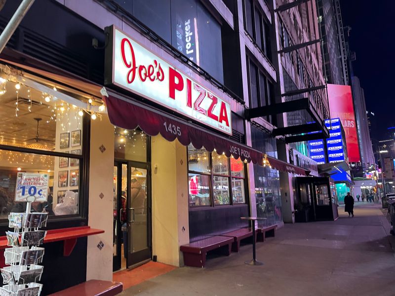 22 Late-Night Pizza Windows Across America Where Slices Disappear Faster Than They Hit the Counter 7 Joe's Pizza Broadway - New York, New York