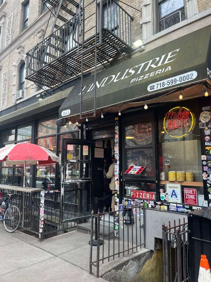 22 Late-Night Pizza Windows Across America Where Slices Disappear Faster Than They Hit the Counter 11 L'industrie Pizzeria - Brooklyn, New York