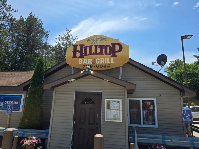 12 Michigan Lakefront Restaurants Where Fried Fish Still Tastes Like A Vacation Night 13 Hilltop Bar & Grill - Oscoda Township, Michigan