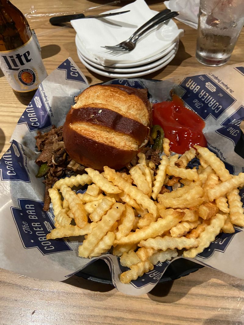 This Michigan Small-Town Bar Serves Chili Dogs So Iconic Locals Try To Eat Their Way Onto the Wall of Fame 18 Beers, Burgers, and Comfort Plates