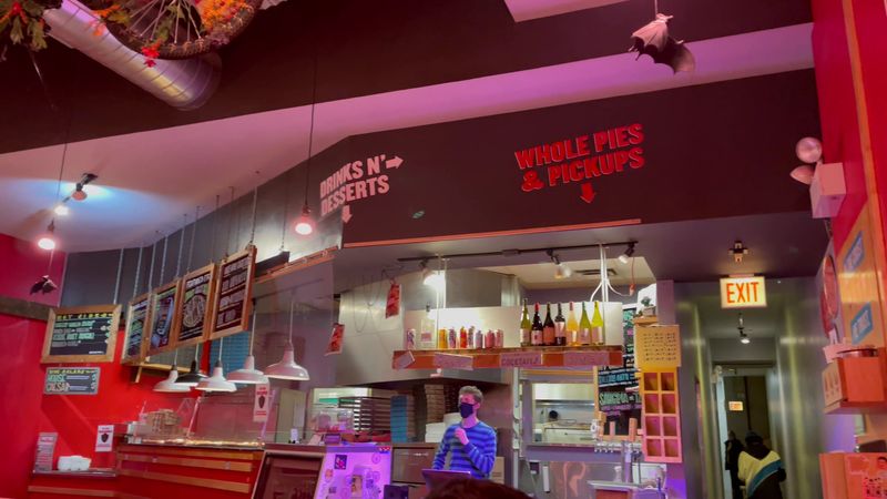 22 Late-Night Pizza Windows Across America Where Slices Disappear Faster Than They Hit the Counter 25 Dimo's Pizza Logan Square - Chicago, Illinois