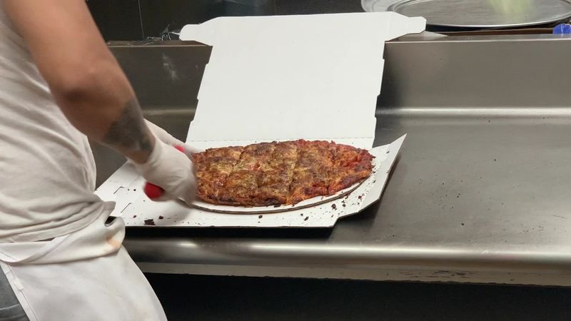 This Chicago Pizza Spot Serves Thin Crust Pizza Locals Say Is The Real Deal 18 A Cheese Pizza That Stands Alone