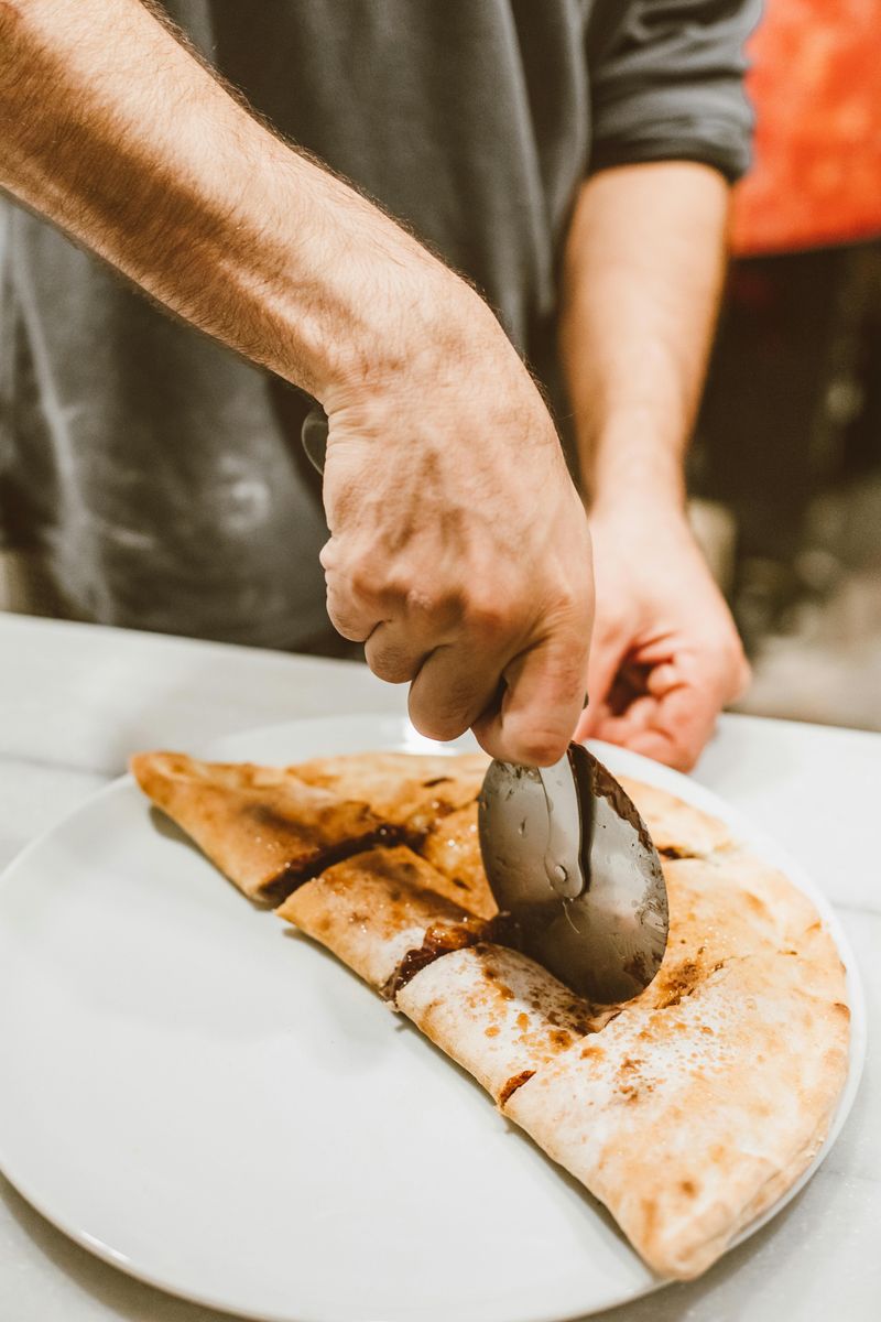 9 Italian Fast-Food Snacks Way Better Than Another Slice of Pepperoni Pizza 7 Street-food calzone