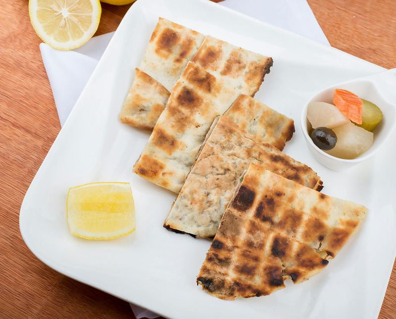 Arayes (grilled meat-stuffed pita)