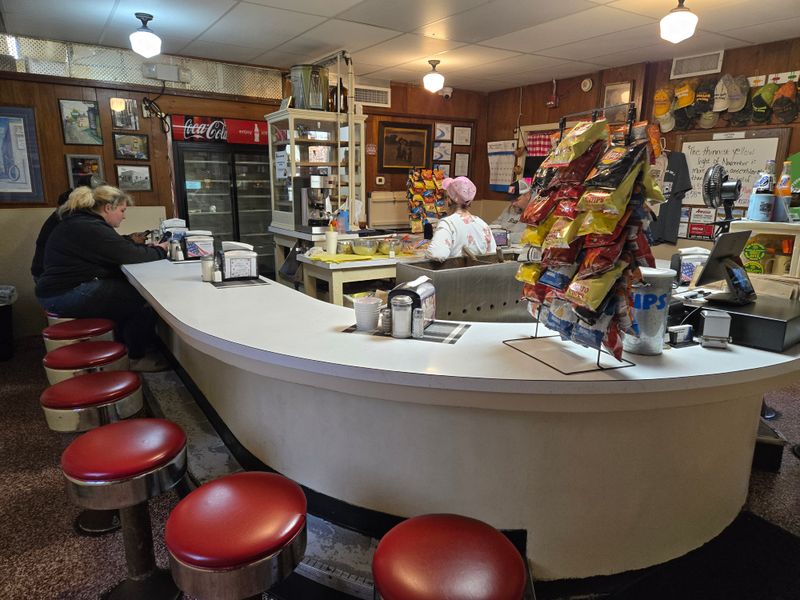 A Counter With Stories In The Stools