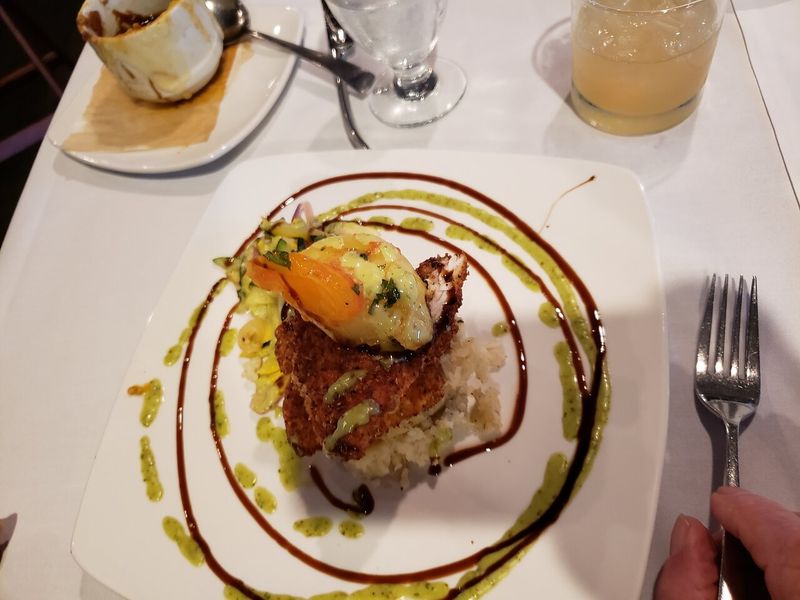 This Michigan Waterfront Grill Serves Whitefish Locals Call “Pure Lake Tradition” 6 Parmesan Crusted Whitefish