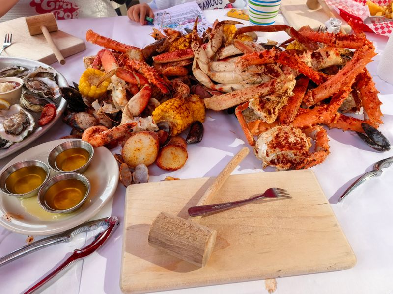 This Washington Waterfront Crab Shack Serves Seafeast Buckets Locals Say Are “Worth Any Detour To The Pier” 6 The Legendary Seafeast Experience