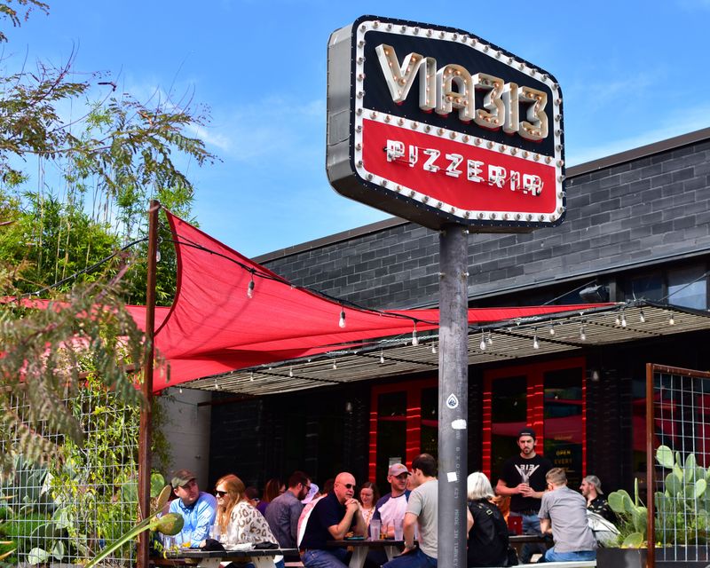 22 Late-Night Pizza Windows Across America Where Slices Disappear Faster Than They Hit the Counter 14 Via 313 Pizza - Austin, Texas