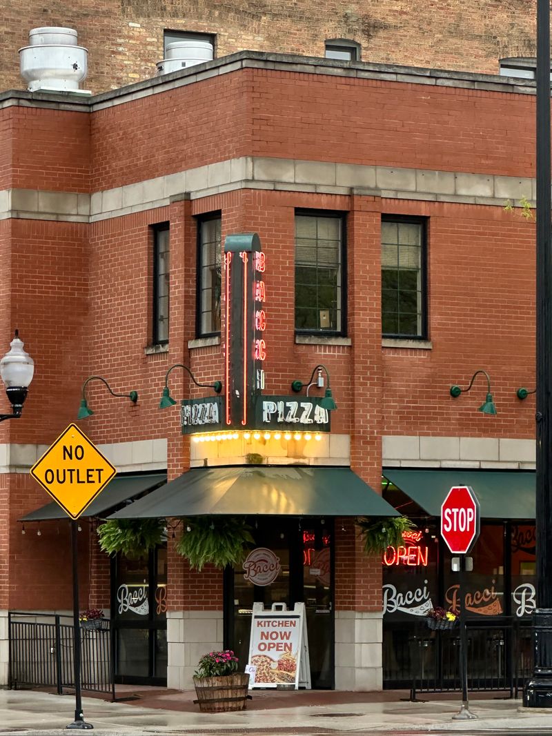 22 Late-Night Pizza Windows Across America Where Slices Disappear Faster Than They Hit the Counter 17 Bacci Pizzeria on Taylor Street - Chicago, Illinois