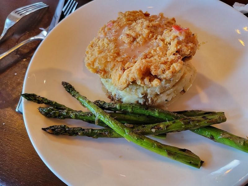 This Michigan Waterfront Grill Serves Whitefish Locals Call “Pure Lake Tradition” 9 Crab Cakes Starter