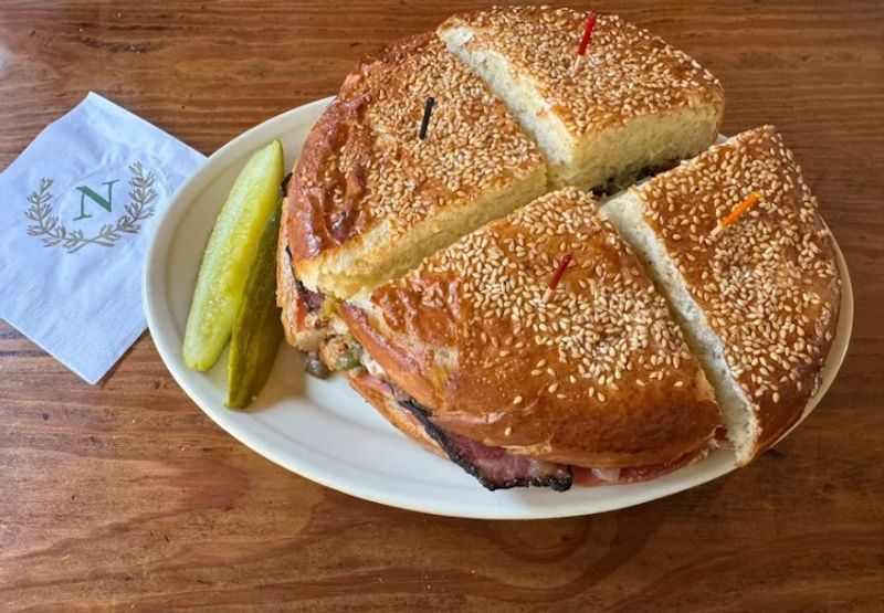 This Louisiana French Quarter Café Serves Warm Muffulettas So Good, Every Bite Feels Like Its Own Little Holiday 15 Budget Friendly Game Plan