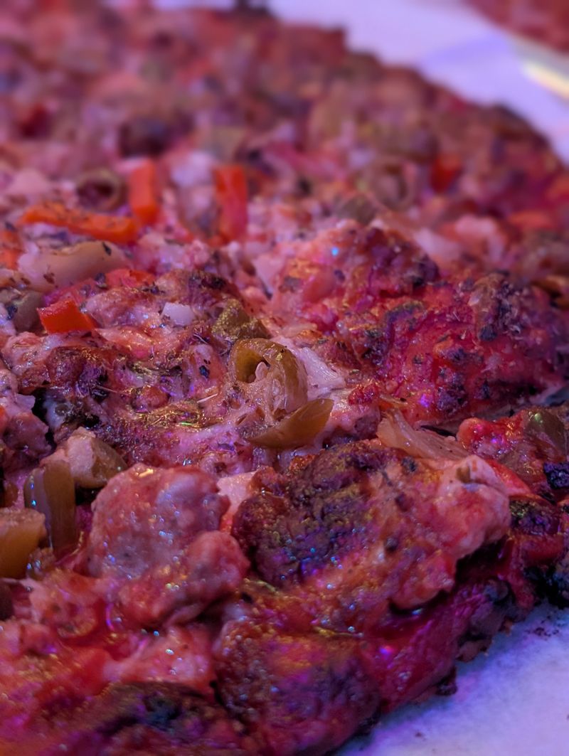 This Chicago Pizza Spot Serves Thin Crust Pizza Locals Say Is The Real Deal 28 Neighborhood Pride On A Pan