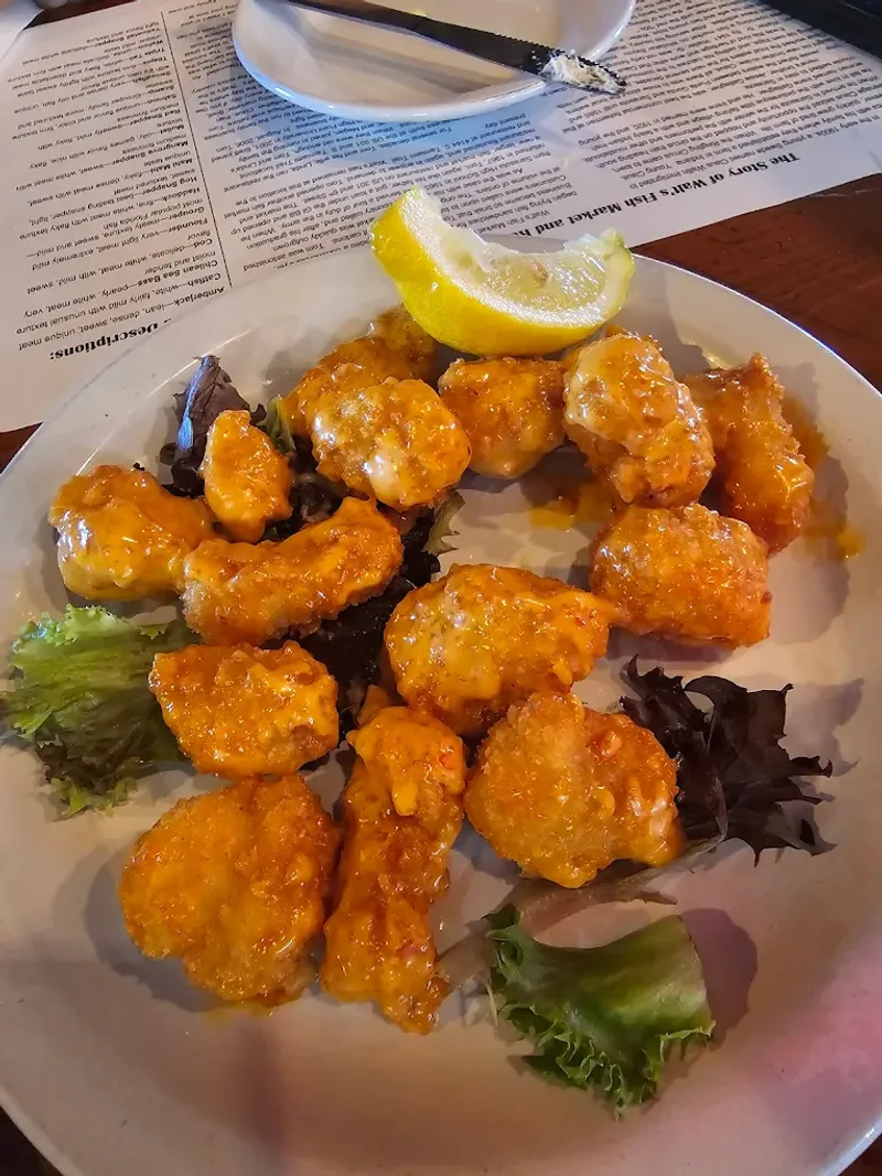 People Plan Detours Just to Eat at This Florida Tiki Bar 12 Conch Fritters And Gator Bites