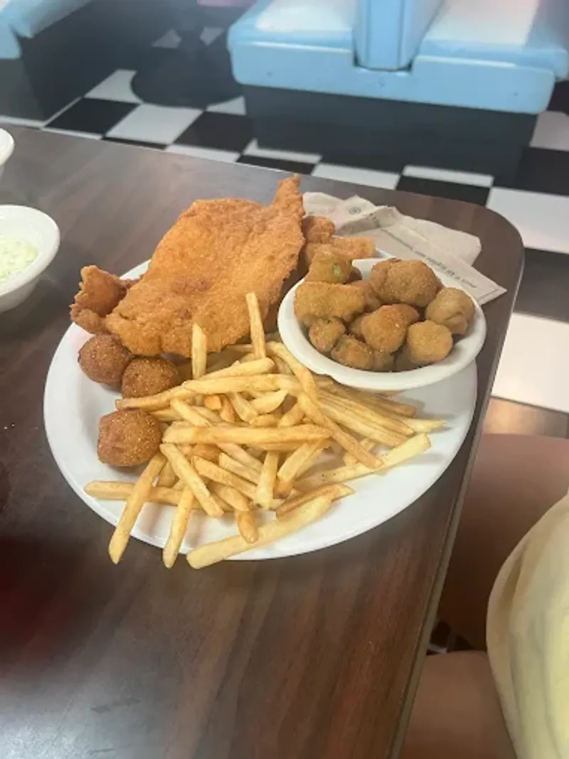 This Florida Lunch Counter Still Feels Like the 1970s – In the Best Way 8 Hush Puppies And Onion Rings Worth The Mess