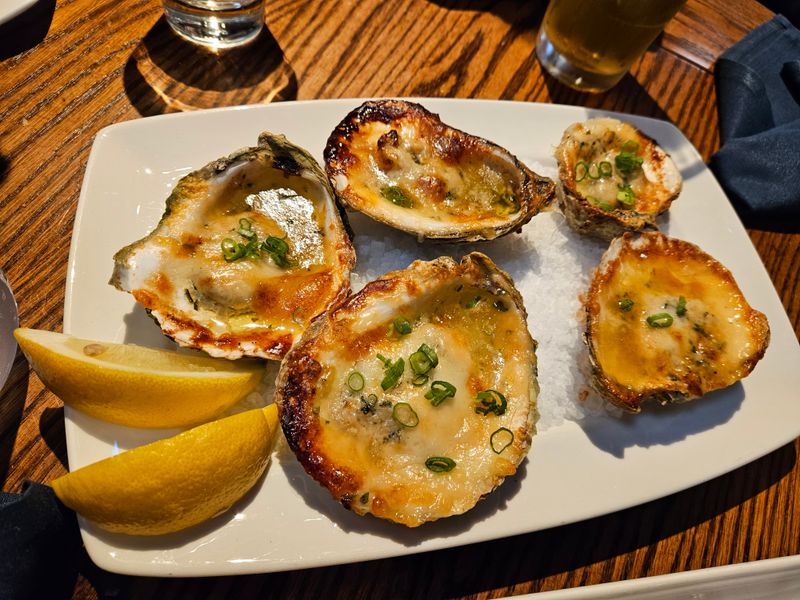 This Washington Oyster Bar Shucks So Fast, You’ll Wonder How The Line Ever Ends 9 Baked Oysters, Butter and Heat