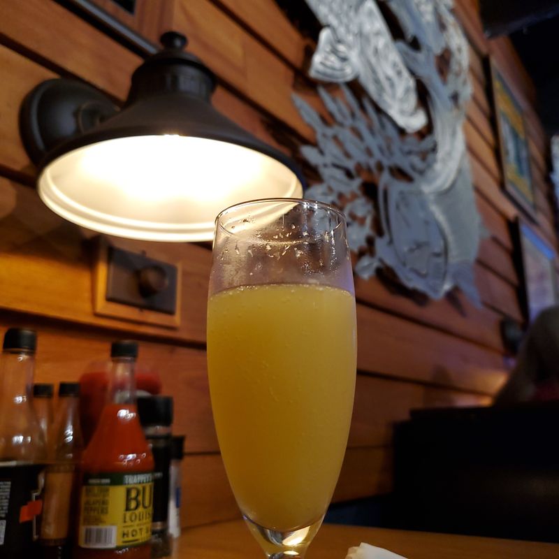 Cocktails at the Wood-Paneled Bar