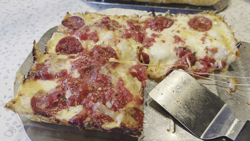 24 Pizza Places Across America Where Thin Crust vs Thick Crust Is the Main Conversation 12 Buddy's Pizza - Detroit, Michigan