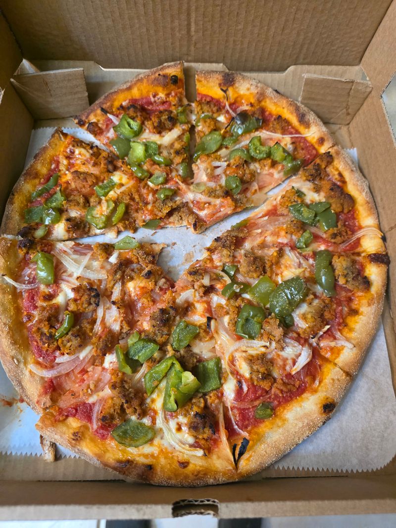 11 Florida Late-Night Eats Spots Locals Hit When Everything Else Is Closed 9 Vinny D's Pizza take out - New Port Richey, Florida