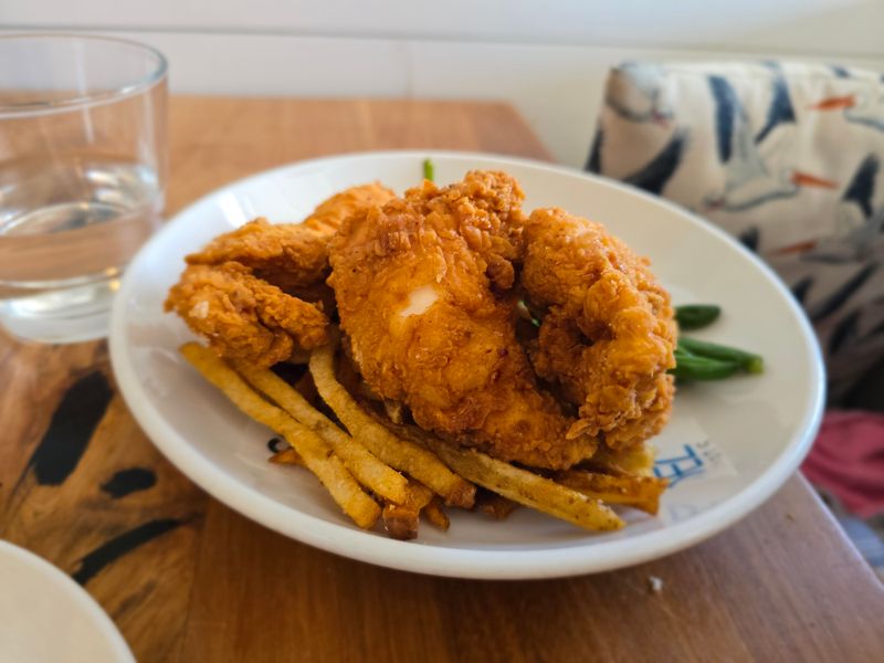 9 Delaware Beachside Seafood Spots Where Crab Fries Disappear First 12 Bluecoast Seafood Grill & Raw Bar Bethany - Bethany Beach, Delaware