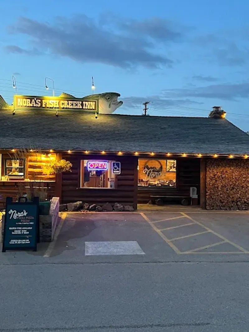 10 Wyoming Mountain Town Cafes Serving Burgers That Hit After A Long Drive 3 Nora's Fish Creek Inn - Wilson, Wyoming