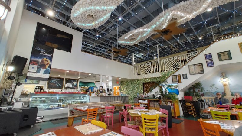 This Legendary Florida Cuban Restaurant Is Known for Its Lechon Asado 10 Upstairs Art Gallery Vibes