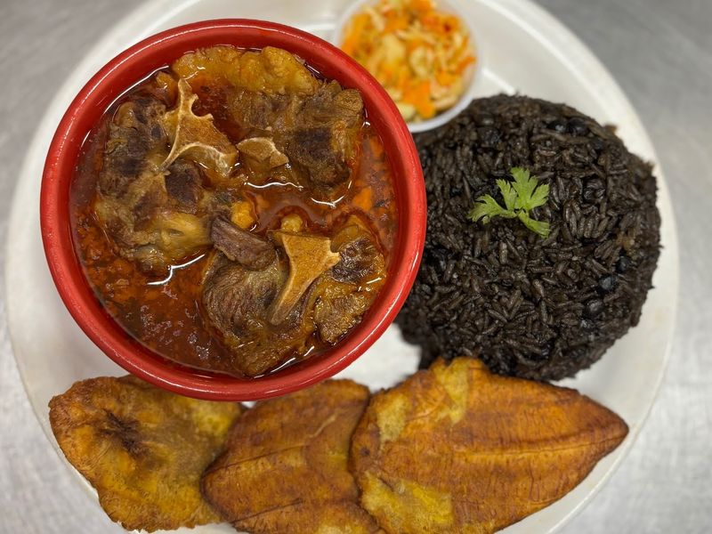 This Unassuming Haitian Spot In Port St. Lucie Is Serving Griot And Oxtails Worth The Drive 3 Braised Oxtails Over Rice
