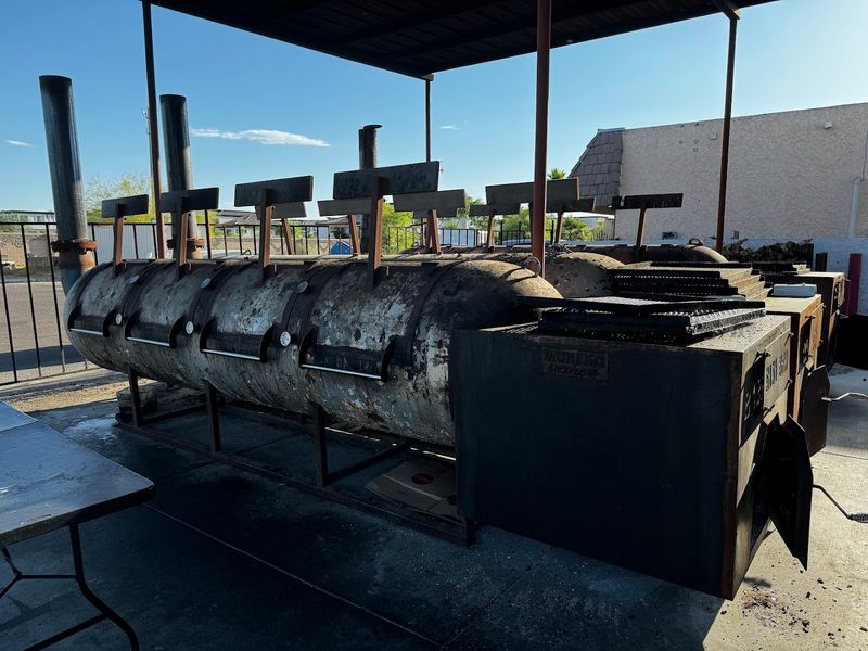 The Rows of Smokers Out Back Doing the Real Work