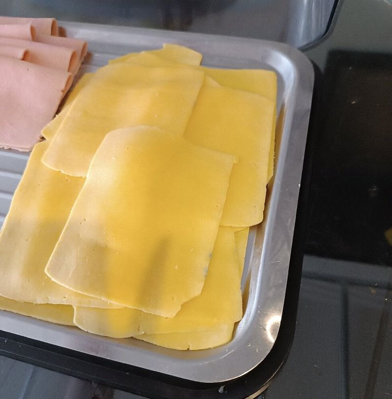 22 Foods People Used to Eat Without Thinking - and Now They’d Read the Ingredients Twice 2 Processed cheese slices