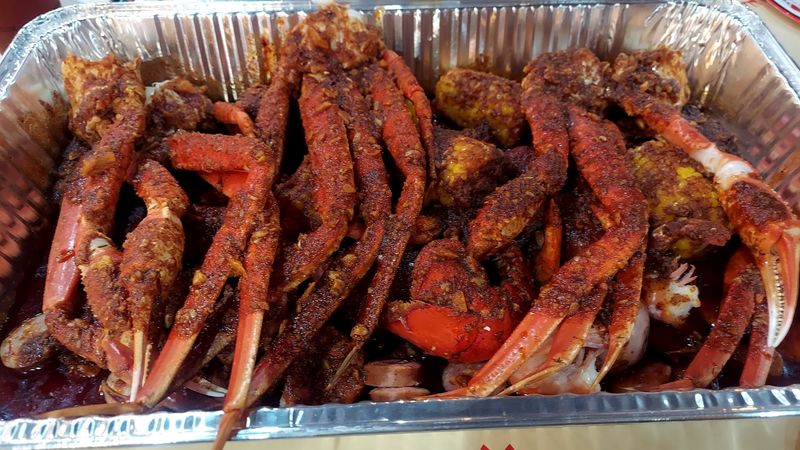 9 Florida Seafood Boil Spots That Always Feel Like A Party 2 Mr. & Mrs. Crab Juicy Seafood & Bar - Kirkman - Orlando, Florida