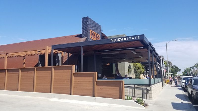 13 California Beach Town Restaurants That Make People Plan the Whole Day Around Dinner 11 Nick's on State - Carlsbad, California