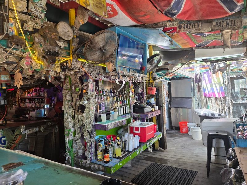 This Small Florida Dive Bar Is Wonderfully Weird 9 The Indoor and Outdoor Bar Setup That Works Surprisingly Well