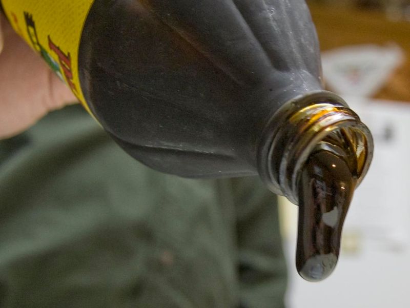 20 Foods That Used to Fill Every Kitchen - and Slowly Disappeared Without a Reason 11 Molasses bottles