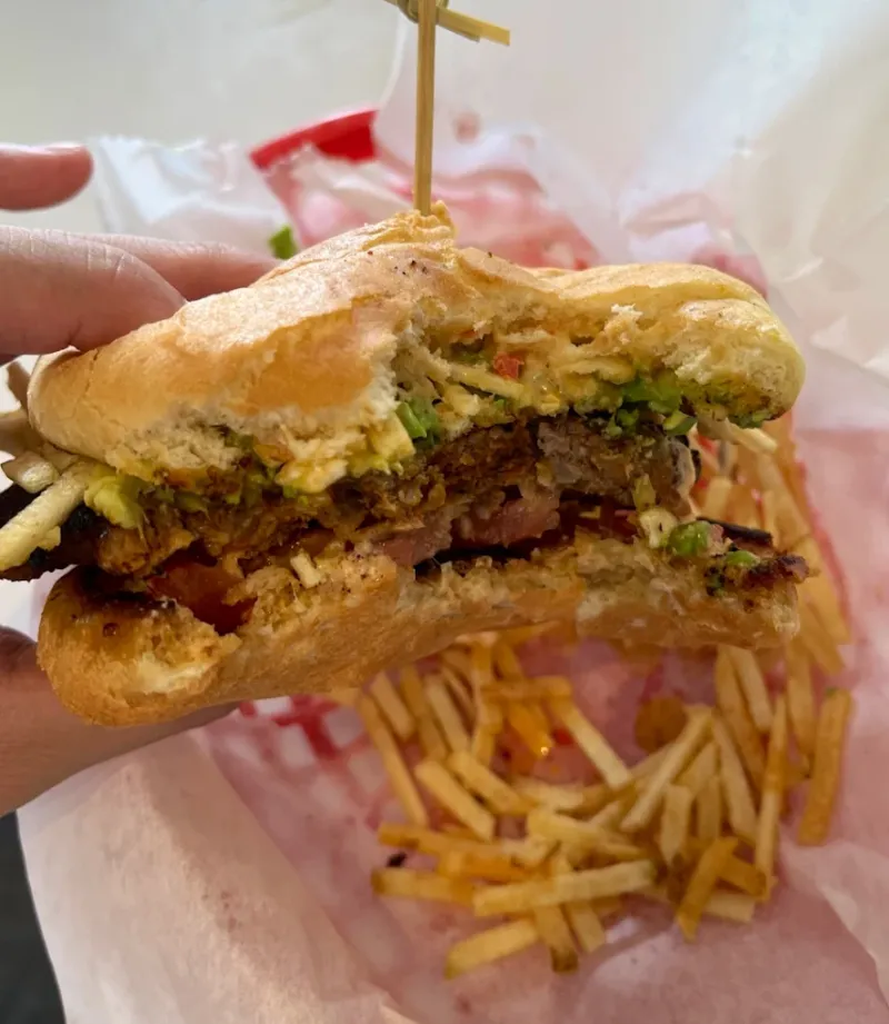 This Humble Florida Restaurant Serves a Pollo Asado Sandwich That's Out of This World 9 The Frita Sandwich: A Cuban Smash Burger Twist