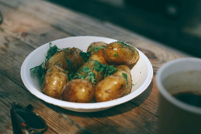 Boiled potatoes with herbs