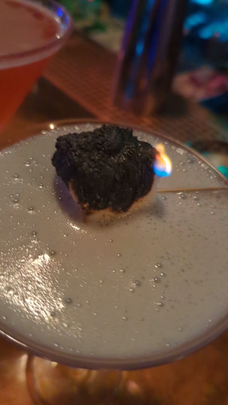 This Halloween-Themed Bar in Florida Feels Like the Addams Family Home 8 Bar Bites and the No-Food Policy You Should Know About